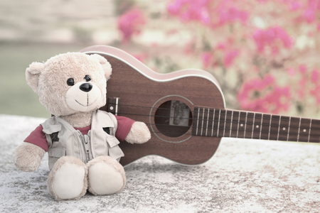 Photo vintage-style of teddy bears and ukulele.の写真素材