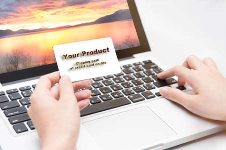 Pay & financial transactions simpler through credit cards and on-line systems. Clipping path at credit card on fileの写真素材