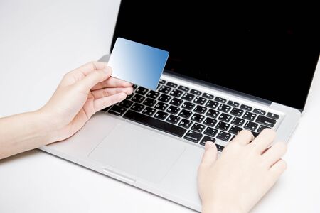 Pay & financial transactions simpler through credit cards and on-line systems. Clipping path at credit card on fileの写真素材