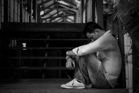 The man was disappointed and sad with the problems of life.の写真素材