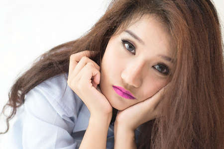 Digital watercolor image. Beautiful women relaxing in the bedroomの写真素材