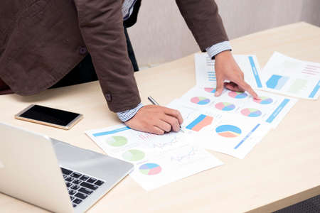 Young asian businessman working in an office.の写真素材