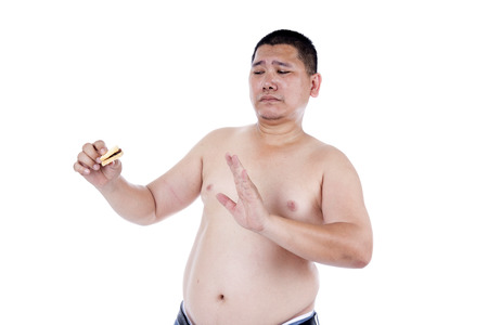 Belly fat people at large from eating behaviors. Junk food. Enjoy eatingの写真素材