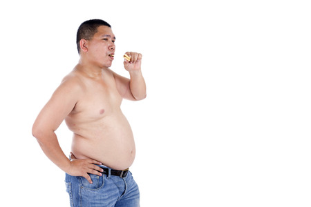 Belly fat people at large from eating behaviors. Junk food. Enjoy eatingの写真素材