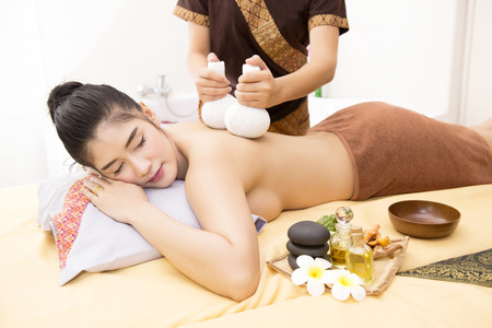 Women pay attention to health and beauty. The spa facial and body massage.の写真素材