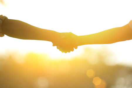 Handshake : Photos of hands touch each otherの写真素材