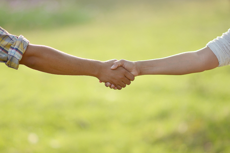 Handshake : Photos of hands touch each otherの写真素材