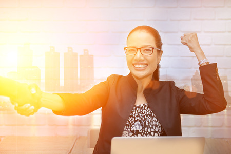 Business people shaking hands to congratulate the agreement.の写真素材