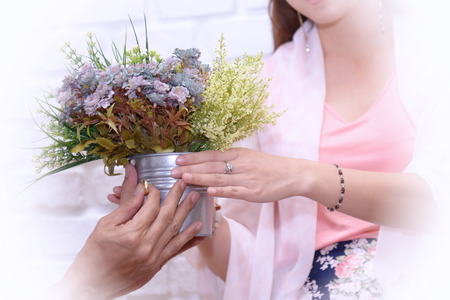 Will you marry me: young men preparing flowers and rings to propose marriage.の写真素材