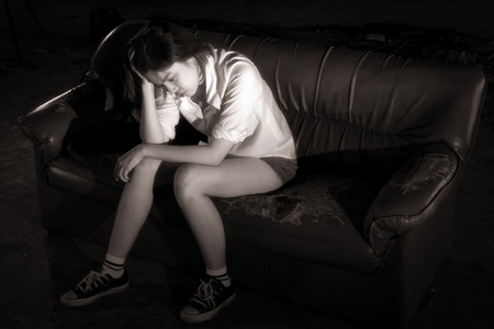 Teenage girls at risk of suicide. Due to family problems, love and hormonal changes.の写真素材