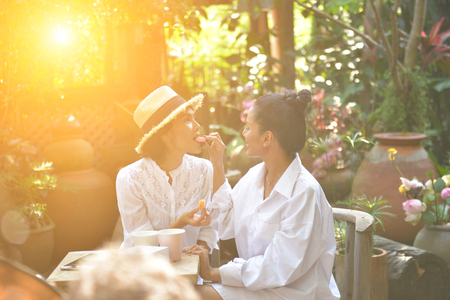 Couples living together happily in the backyard.の写真素材