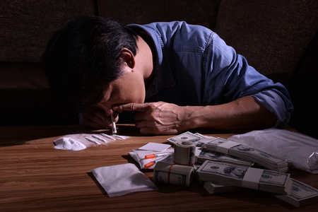 Drugs are a threat to society. Image concept involves drugs.の写真素材