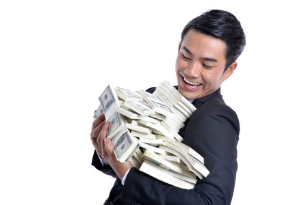 A successful business ventures. Money dollar in hand.の写真素材