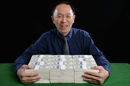 Investors succeeded with investing a lot of money.の写真素材