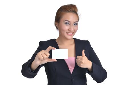 Young businesswoman with credit card in handの写真素材