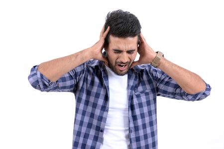 Handsome man with different expressions on a white background.の写真素材
