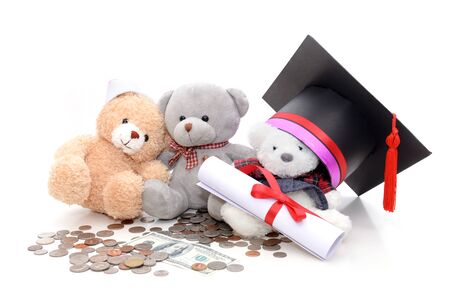 Congratulation concept: Teddy bear with a graduation hat With the concept of scholarship fundingの写真素材