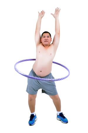 Fat man exercise by playing hula hoop.の写真素材