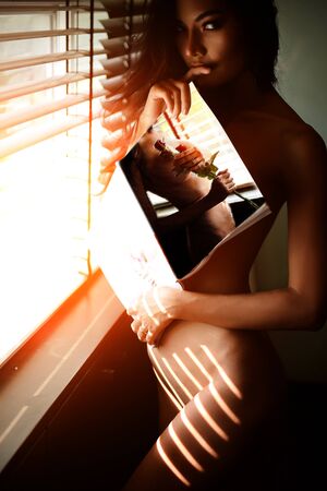 Women with beautiful body look seductive charm.の写真素材