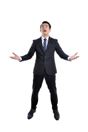 Young businessman With the stock market and the currencyの写真素材