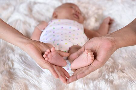 Expression of love warmth Mother and babyの写真素材