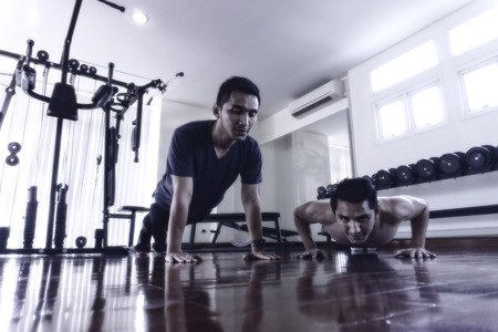 Twins with exercise And build muscle to look better.の写真素材