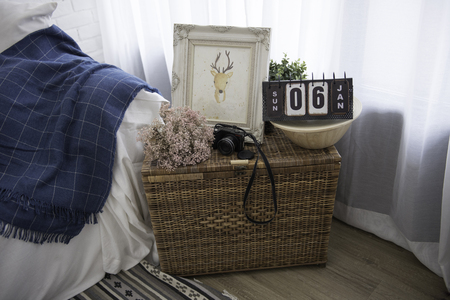 A cute view of the living room with a table top calendar.の写真素材