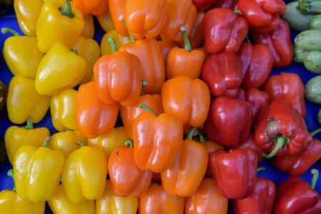 Paprika peppers beeing sold at a street marketの写真素材