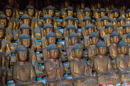 Busan South Korea, dozens of Buddhas inside the mountain Buddhist temple of Seokbulsa.