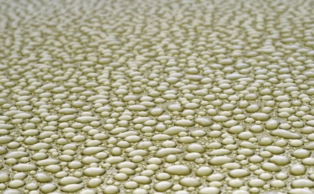 Water drops over metal backgroundの写真素材