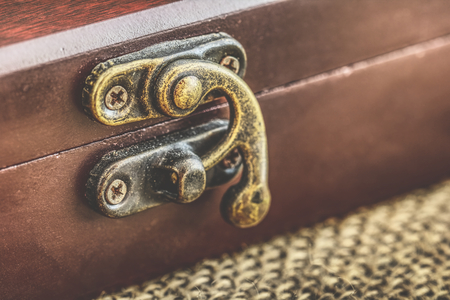Antique chest, Closed old wooden box with metal lockの写真素材
