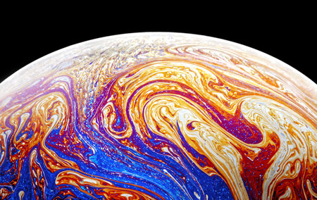 Abstract world of colors and shapes. Light interference, colorful and beautiful patterns of soap bubble.の写真素材