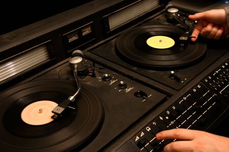 dj's hand work with vinyl soviet dj's mixer of 80s made in USSRの写真素材