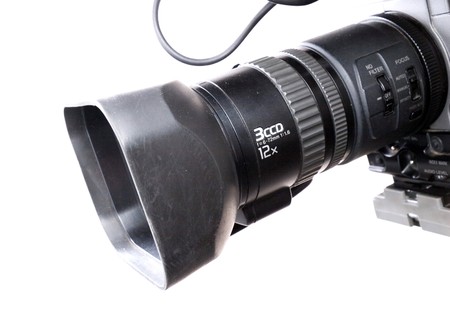close-up lens part of digital video camera recorder on white background