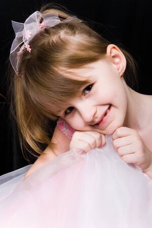 portrait of little girl in pink dressの写真素材