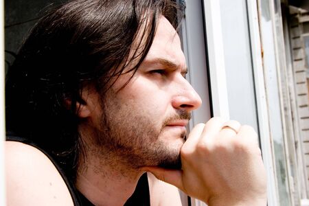 the portrait of young man at natureの写真素材