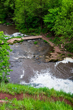 view from top of Dzhurynskyi (Chervonohorodskyi) waterfall is located on the Dzhuryn river, Ternopil region of western Ukraineの写真素材