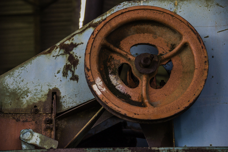 close-up details of old rusty combine harvesterの写真素材