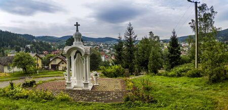 chapel of the Virgin Mary on top of a hill in the forest in Skhidnytsya, Lviv region of Western Ukraineの写真素材