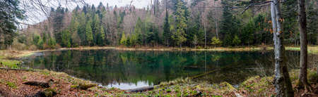Polianytske lake in the forest in carpathian mountains, national park Skolivski beskidy, Lviv region of Western Ukraineの写真素材