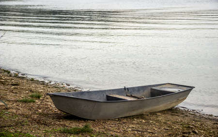 wooden boat on the Dnister river bank, Podilski tovtry National park, Khmelnitskiy region of Western Ukraineの写真素材