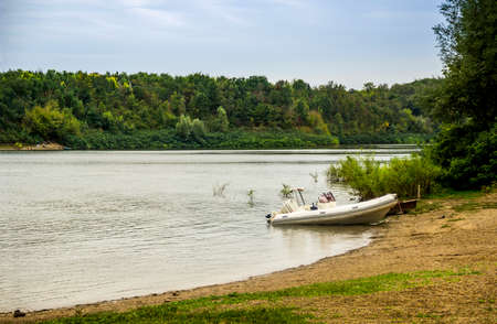 wooden boat on the Dnister river bank, Podilski tovtry National park, Khmelnitskiy region of Western Ukraineの写真素材