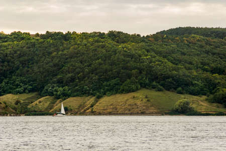 small yacht on Dniester river, National Nature Park Podilski tovtry, Khmelnytsky region of Western Ukraineの写真素材
