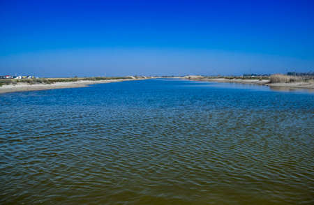 a salty lagoon near the sea on the Arabat Spit on the Sea of ââAzov, Ukraineの写真素材