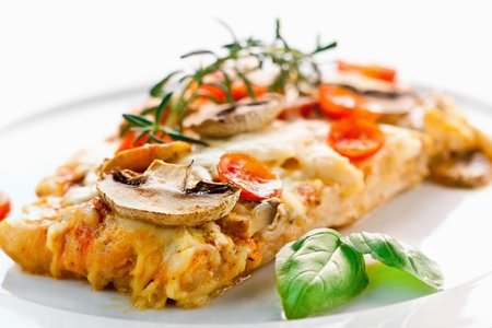Tasty healthy fish fillet with vegetables and mushroomsの写真素材
