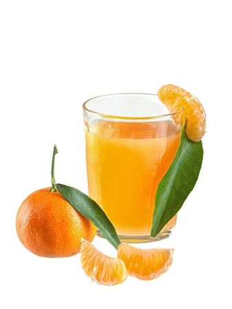 Glasses of healthy fresh juice of mandarins on brown background の写真素材