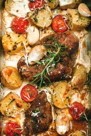 Delicious baked potatoes with pork meatの写真素材