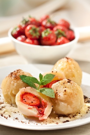 Sweet dumplings filled with strawberriesの写真素材