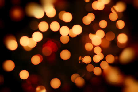 Abstract background of christmas orange lightsの写真素材