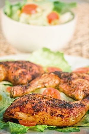 Fried chicken with vegetable saladの写真素材